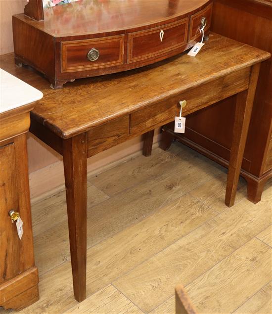 An oak side table W.99cm